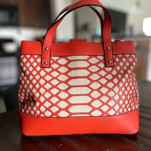 Joe’s Orange and Canvas Handbag